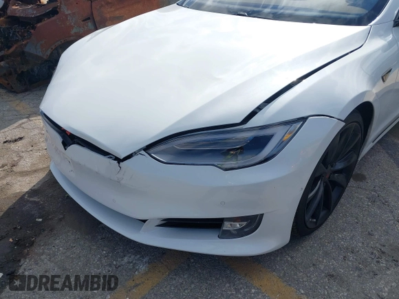 2016 Tesla Model S 90D with VIN 5YJSA1E27GF153525, listed as a IAAI auction lot 41539221 with 145,771 mi miles and . Bid and sale history available at DreamBid. Image 6.
