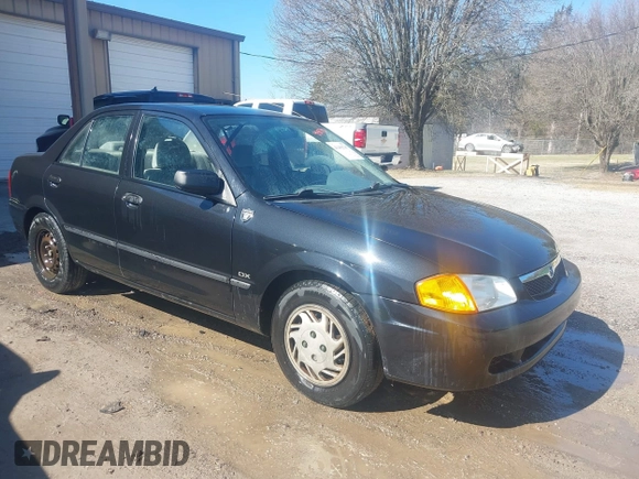 2000 Mazda Protege DX with VIN JM1BJ2227Y0303448, listed as a IAAI auction lot 41482747 with 206,542 mi miles and . Bid and sale history available at DreamBid. Image 1.