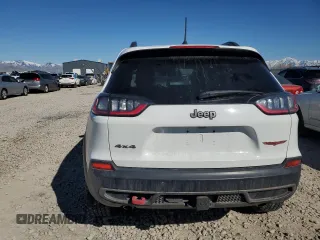 2019 Jeep Cherokee Trailhawk with VIN 1C4PJMBX7KD336494, listed as a Copart auction lot 50346545 with 69,994 mi miles and Salvage Title. Bid and sale history available at DreamBid. Image 6.