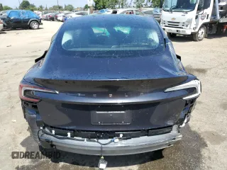 2025 Tesla Model 3 Long Range with VIN 5YJ3E1EA5SF999984, listed as a Copart auction lot 58244825 with Not provided miles and Salvage title. Bid and sale history available at DreamBid. Image 6.