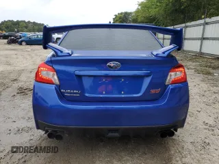 2015 Subaru WRX STI with VIN JF1VA2L69F9837435, listed as a Copart auction lot 73206354 with 57,811 mi miles and Salvage title. Bid and sale history available at DreamBid. Image 6.