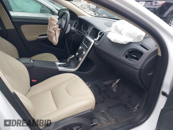 2017 Volvo S60 Inscription with VIN LYV402HKXHB148240, listed as a IAAI auction lot 41618292 with 77,870 mi miles. Bid and sale history available at carsss.com. Image 5.