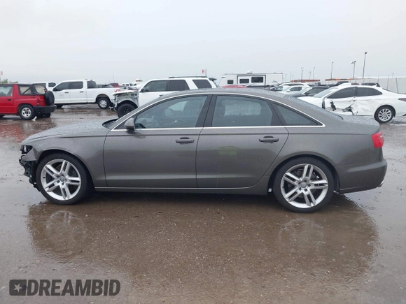 2014 Audi A6 Premium Plus z VIN WAUGFAFC3EN087176, wystawiony jako IAAI lot #42117602 z przebiegiem 53 571 mil mil oraz . Historia ofert i sprzedaży dostępna na DreamBid. Obrazek 15.