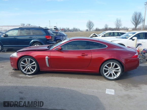 2008 Jaguar XK with VIN SAJWA43C089B22700, listed as a IAAI auction lot 41585734 with 67,946 mi miles. Bid and sale history available at carsss.com. Image 14.