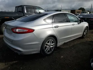 2014 Ford Fusion SE with VIN 3FA6P0H77ER300719, listed as a Copart auction lot 51086775 with 191,835 mi miles and Salvage Title. Bid and sale history available at carsss.com. Image 3.