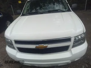 2013 Chevrolet Tahoe Commercial with VIN 1GNLC2E05DR351035, listed as a IAAI auction lot 42641974 with 265,608 mi miles and . Bid and sale history available at DreamBid. Image 12.
