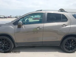 2021 Chevrolet Trax LT with VIN KL7CJLSBXMB359468, listed as a IAAI auction lot 41982149 with 199,685 mi miles and . Bid and sale history available at DreamBid. Image 14.