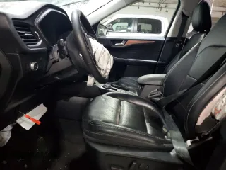 2021 Ford Escape Titanium with VIN 1FMCU9J91MUA57451, listed as a Copart auction lot 44678135 with 74,795 mi miles and Salvage title. Bid and sale history available at DreamBid. Image 7.