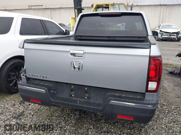2018 Honda Ridgeline Sport with VIN 5FPYK2F19JB000713, listed as a IAAI auction lot 41300244 with 52,119 mi miles and . Bid and sale history available at DreamBid. Image 16.