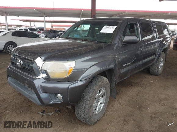 2013 Toyota Tacoma z VIN 3TMLU4EN9DM106995, wystawiony jako IAAI lot #42373093 z przebiegiem Nie podano mil oraz . Historia ofert i sprzedaży dostępna na DreamBid. Obrazek 17.