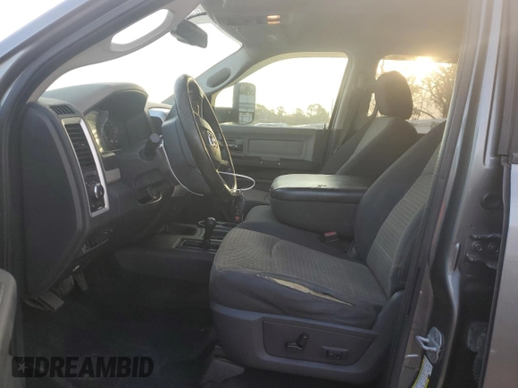 2012 Ram 2500 Power Wagon with VIN 3C6TD5ET7CG328847, listed as a Copart auction lot 74964874 with 212,076 mi miles and Salvage Title. Bid and sale history available at carsss.com. Image 7.