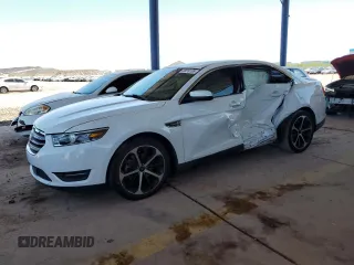 2015 Ford Taurus SEL z VIN 1FAHP2E88FG151537, wystawiony jako Copart lot #58010185 z przebiegiem 99 668 mil mil oraz Szkoda całkowita • Salvage title. Historia ofert i sprzedaży dostępna na DreamBid. Obrazek 1.