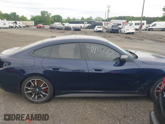 2024 BMW i4 M50 z VIN WBY33AW09RFS45891, wystawiony jako IAAI lot #41912747 z przebiegiem 313 988 mil mil oraz . Historia ofert i sprzedaży dostępna na DreamBid. Obrazek 13.