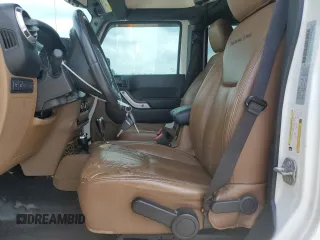 2016 Jeep Wrangler Unlimited Rubicon с VIN 1C4BJWFGXGL349057, выставлен на аукционе Copart как лот 61608945 с пробегом 118 200 миль миль и Списание • Salvage title. История ставок и продаж доступна на DreamBid. Изображение 7.