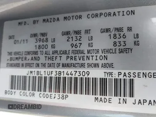 2011 Mazda Mazda3 i Sport with VIN JM1BL1UF3B1447309, listed as a IAAI auction lot 41855254 with 130,133 mi miles. Bid and sale history available at carsss.com. Image 9.
