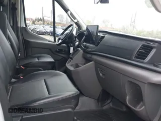 2023 Ford Transit Cargo with VIN 1FTBR1CG5PKA86059, listed as a IAAI auction lot 41951060 with 56,323 mi miles. Bid and sale history available at carsss.com. Image 5.