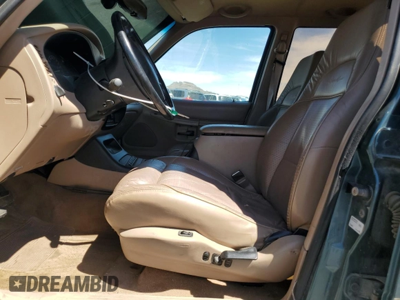 1997 Ford Explorer XLT z VIN 1FMDU35P4VZB06107, wystawiony jako Copart lot #52797485 z przebiegiem 172 186 mil mil oraz Szkoda całkowita • Salvage title. Historia ofert i sprzedaży dostępna na DreamBid. Obrazek 7.