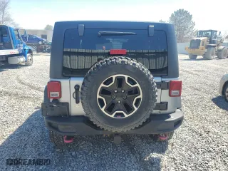 2015 Jeep Wrangler Unlimited Rubicon Hard Rock with VIN 1C4HJWFG2FL686556, listed as a Copart auction lot 54049955 with 126,675 mi miles and Salvage Title. Bid and sale history available at carsss.com. Image 6.
