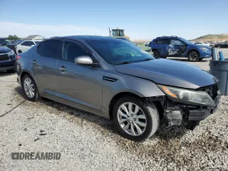 2015 Kia Optima EX с VIN 5XXGN4A71FG514109, выставлен на аукционе Copart как лот 60502465 с пробегом 190 945 миль миль и Списание • Salvage title. История ставок и продаж доступна на DreamBid. Изображение 4.