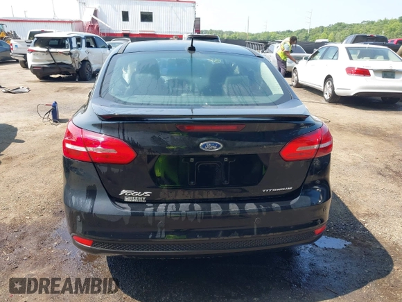 2018 Ford Focus Titanium with VIN 1FADP3J22JL220986, listed as a IAAI auction lot 42410253 with 40,791 mi miles and . Bid and sale history available at DreamBid. Image 16.