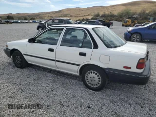1990 Toyota Corolla z VIN 1NXAE94A0LZ089770, wystawiony jako Copart lot #75318334 z przebiegiem 161 894 mil mil oraz Szkoda całkowita • Salvage title. Historia ofert i sprzedaży dostępna na DreamBid. Obrazek 2.