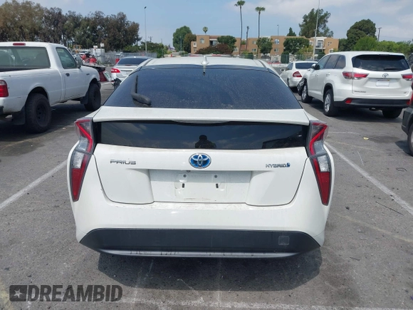 2016 Toyota Prius Two z VIN JTDKBRFU3G3024092, wystawiony jako IAAI lot #42338381 z przebiegiem 87 216 mil mil oraz . Historia ofert i sprzedaży dostępna na DreamBid. Obrazek 16.