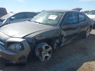 2009 Dodge Charger SXT with VIN 2B3KA33V29H627209, listed as a IAAI auction lot 41666032 with 189,916 mi miles and . Bid and sale history available at carsss.com. Image 6.