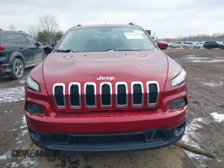 2014 Jeep Cherokee Latitude with VIN 1C4PJMCS2EW175306, listed as a IAAI auction lot 41620115 with 156,578 mi miles and . Bid and sale history available at carsss.com. Image 12.