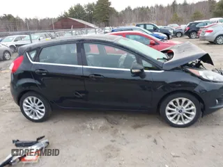 2017 Ford Fiesta Titanium with VIN 3FADP4FJ6HM112434, listed as a IAAI auction lot 41803424 with Not Provided miles and . Bid and sale history available at DreamBid. Image 13.