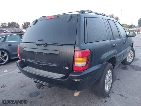 2002 Jeep Grand Cherokee Limited with VIN 1J8GW58NX2C327798, listed as a IAAI auction lot 42082634 with 167,863 mi miles. Bid and sale history available at carsss.com. Image 4.