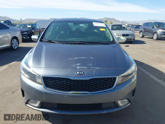 2018 Kia Forte LX with VIN 3KPFL4A77JE220538, listed as a IAAI auction lot 42095964 with 98,977 mi miles and . Bid and sale history available at DreamBid. Image 12.