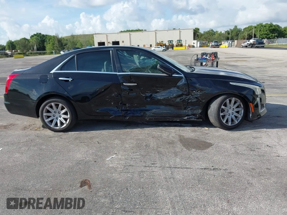 2015 Cadillac CTS RWD with VIN 1G6AP5SX8F0140364, listed as a IAAI auction lot 42535236 with 126,277 mi miles and . Bid and sale history available at DreamBid. Image 14.
