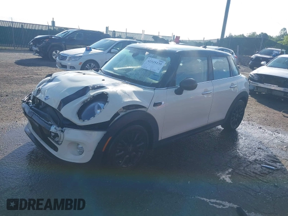 2019 MINI Hardtop 4 Door Cooper with VIN WMWXU1C5XK2J02832, listed as a IAAI auction lot 42525235 with 68,296 mi miles and . Bid and sale history available at DreamBid. Image 17.
