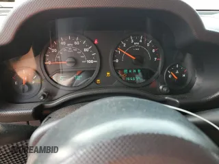 2007 Jeep Wrangler Unlimited X z VIN 1J4GA391X7L169728, wystawiony jako Copart lot #59484265 z przebiegiem 165 674 mil mil oraz Szkoda całkowita • Salvage title. Historia ofert i sprzedaży dostępna na DreamBid. Obrazek 9.