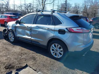 2020 Ford Edge Titanium z VIN 2FMPK4K96LBA00515, wystawiony jako IAAI lot #41757974 z przebiegiem 76 242 mil mil oraz . Historia ofert i sprzedaży dostępna na DreamBid. Obrazek 3.