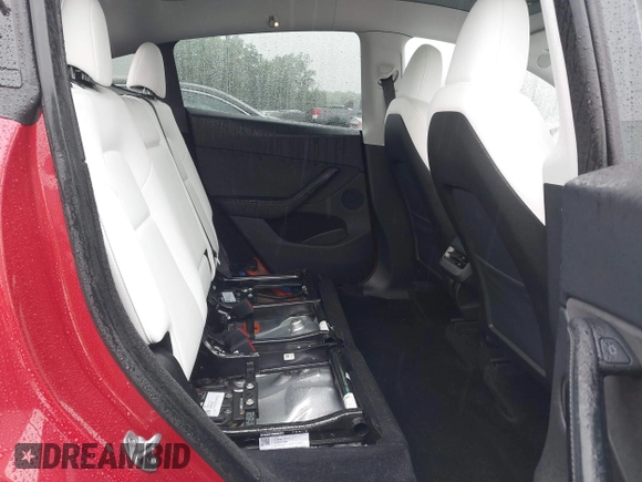 2023 Tesla Model Y Long Range with VIN 7SAYGDEE5PA111262, listed as a IAAI auction lot 42341148 with 19,014 mi miles and . Bid and sale history available at DreamBid. Image 8.
