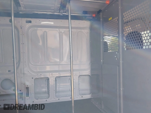 2022 Ford Transit Cargo with VIN 1FTBR1C84NKA76483, listed as a IAAI auction lot 40365786 with 28,854 mi miles and . Bid and sale history available at DreamBid. Image 8.