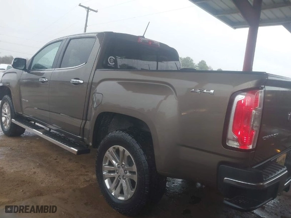 2016 GMC Canyon 4WD SLT with VIN 1GTG6DE35G1100042, listed as a IAAI auction lot 41387193 with 198,004 mi miles. Bid and sale history available at carsss.com. Image 3.