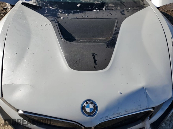2015 BMW i8 z VIN WBY2Z2C51FV392594, wystawiony jako Copart lot #42561715 z przebiegiem Nie podano mil oraz Szkoda całkowita • Salvage title. Historia ofert i sprzedaży dostępna na DreamBid. Obrazek 12.