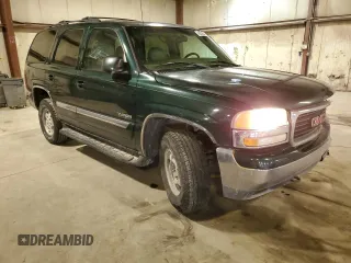 2001 GMC Yukon SLT with VIN 1GKEK13T61J193671, listed as a Copart auction lot 43572535 with 212,529 mi miles and Salvage Title. Bid and sale history available at carsss.com. Image 4.
