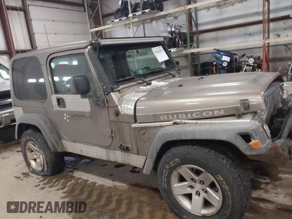 2005 Jeep Wrangler Rubicon with VIN 1J4FA69S65P311732, listed as a IAAI auction lot 41442147 with 174,277 mi miles. Bid and sale history available at carsss.com. Image 13.