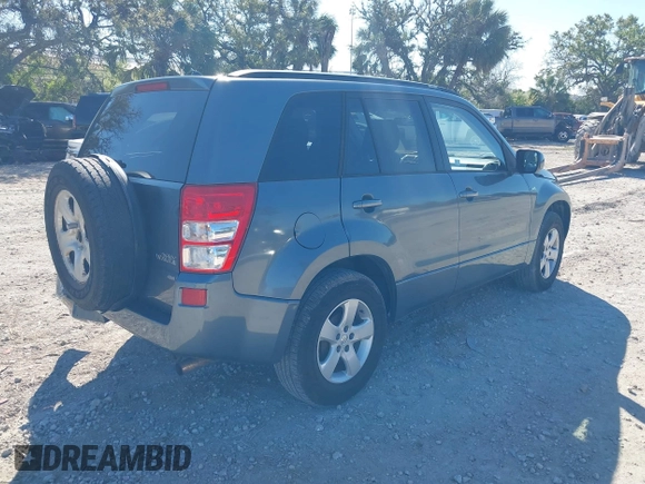 2006 Suzuki Grand Vitara Premium z VIN JS3TD943064100693, wystawiony jako IAAI lot #41772479 z przebiegiem 135 901 mil mil oraz . Historia ofert i sprzedaży dostępna na DreamBid. Obrazek 4.