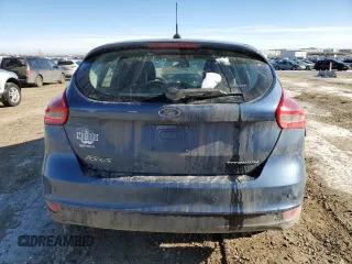 2018 Ford Focus Titanium z VIN 1FADP3N2XJL297048, wystawiony jako Copart lot #61579925 z przebiegiem 68 774 mil mil oraz Szkoda całkowita • Salvage title. Historia ofert i sprzedaży dostępna na DreamBid. Obrazek 6.