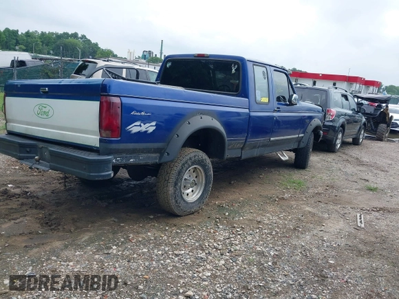 1996 Ford F-150 with VIN 1FTEX14H7TKA14770, listed as a IAAI auction lot 42673904 with 172,553 mi miles and . Bid and sale history available at DreamBid. Image 4.