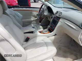 2005 Mercedes-Benz CLK 5.0L with VIN WDBTK75J55F123328, listed as a IAAI auction lot 42082590 with 58,969 mi miles. Bid and sale history available at carsss.com. Image 5.