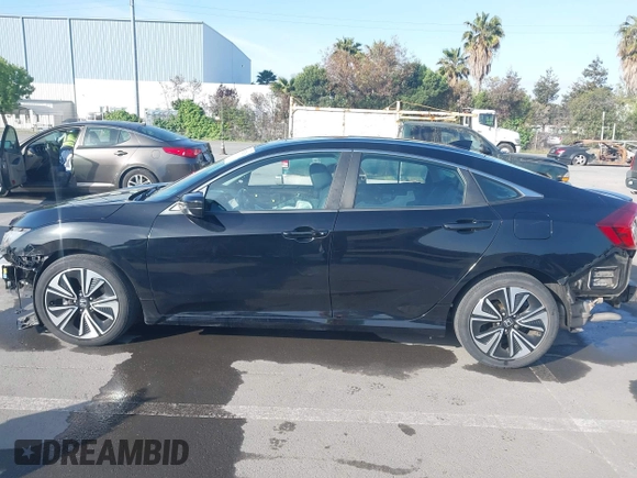 2016 Honda Civic Sedan EX-L with VIN 19XFC1F73GE215112, listed as a IAAI auction lot 42093218 with 67,233 mi miles. Bid and sale history available at carsss.com. Image 15.