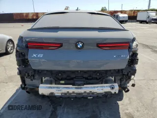 2022 BMW X6 xDrive40i z VIN 5UXCY6C01N9M95573, wystawiony jako Copart lot #54049805 z przebiegiem 24 031 mil mil oraz Szkoda całkowita • Salvage title. Historia ofert i sprzedaży dostępna na DreamBid. Obrazek 6.