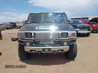 2003 Hummer H2 with VIN 5GRGN23U73H122756, listed as a IAAI auction lot 42194176 with 239,411 mi miles. Bid and sale history available at carsss.com. Image 6.