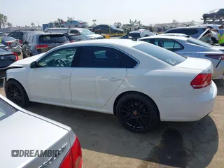 2014 Volkswagen Passat SE z VIN 1VWBN7A3XEC068708, wystawiony jako IAAI lot #42439517 z przebiegiem 144 563 mil mil oraz . Historia ofert i sprzedaży dostępna na DreamBid. Obrazek 15.