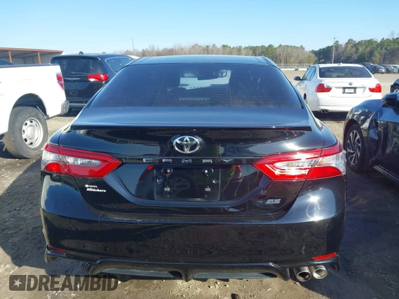 2018 Toyota Camry LE z VIN 4T1B11HK4JU151656, wystawiony jako IAAI lot #41524694 z przebiegiem 52 581 mil mil oraz . Historia ofert i sprzedaży dostępna na DreamBid. Obrazek 16.
